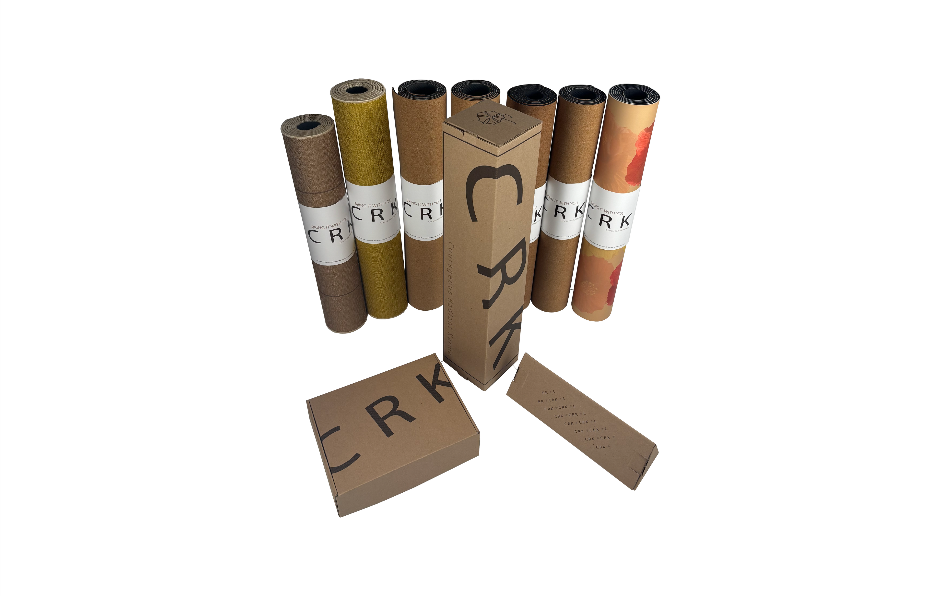 Rolled up, high quality yoga mats in beautiful product packaging with eco-friendly and well-designed product boxes. 